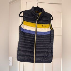 Cotopaxi Quilted Puffer Vest in Dark Navy with Yellow, White & Blue Stripes